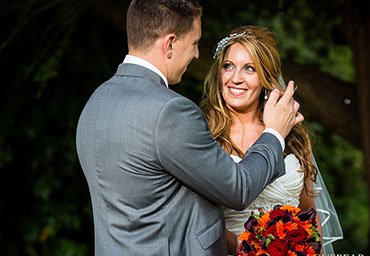 Groom looking at his beautiful bride