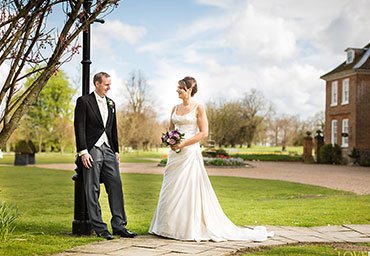 Wedding portrait outside venue in Kent.