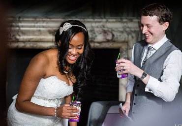 husband and wife toasting the guests