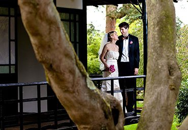 wedding day portrait of married couple outdoors