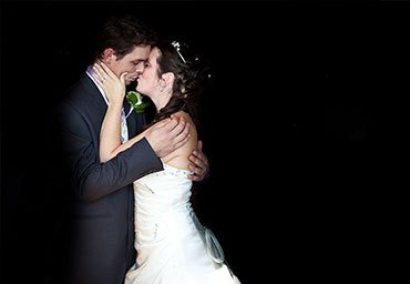Married couple kissing portrait