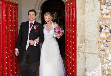 Married couple leaving church photo