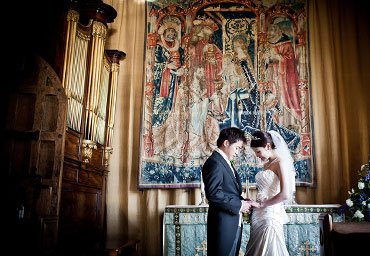 Couple looking at wedding rings photo